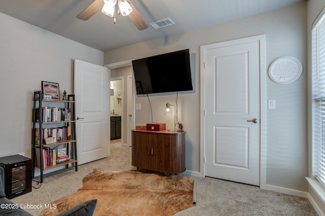 7511 31st St, Lubbock, TX 79407 - bedroom featuring light colored carpet and a ceiling fan