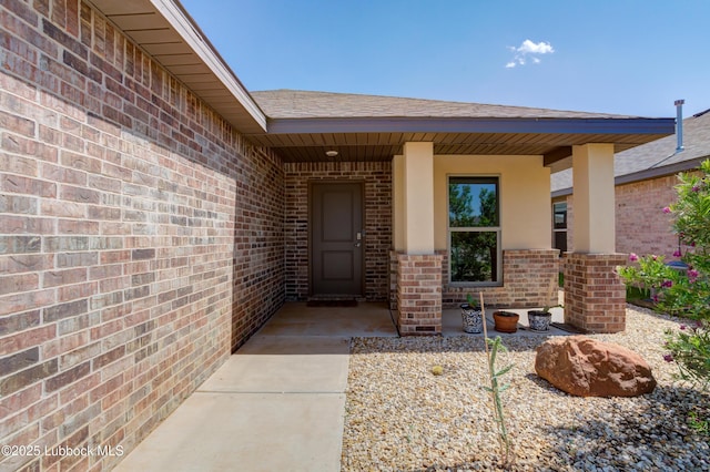 7511 31st St, Lubbock, TX 79407 - entrance to property with brick siding and a shingled roof