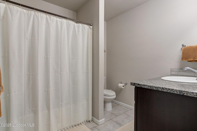 7511 31st St, Lubbock, TX 79407 - full bath with vanity, tile patterned flooring, and a shower with curtain