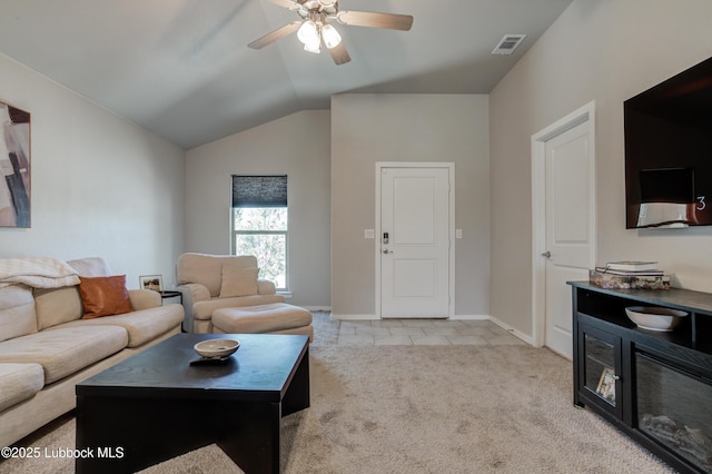 7511 31st St, Lubbock, TX 79407 - carpeted living area with a ceiling fan, lofted ceiling, and tile patterned flooring
