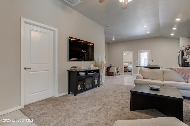 7511 31st St, Lubbock, TX 79407 - carpeted living room featuring ceiling fan, recessed lighting, and vaulted ceiling