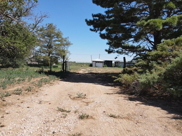 view of yard featuring a garage