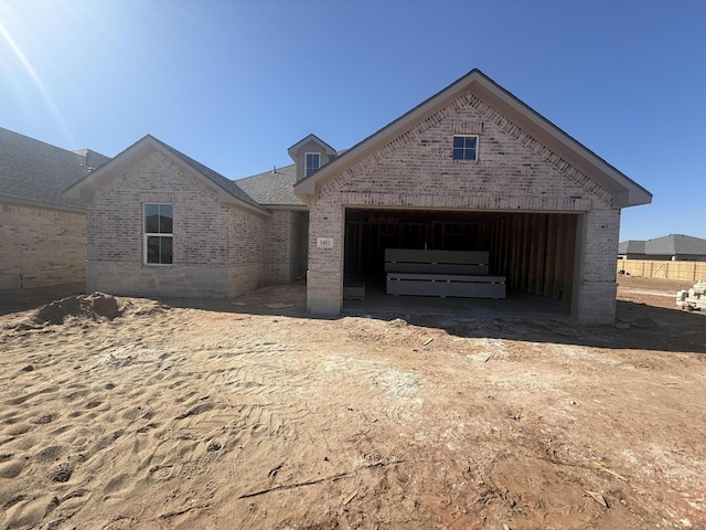 property in mid-construction with a garage