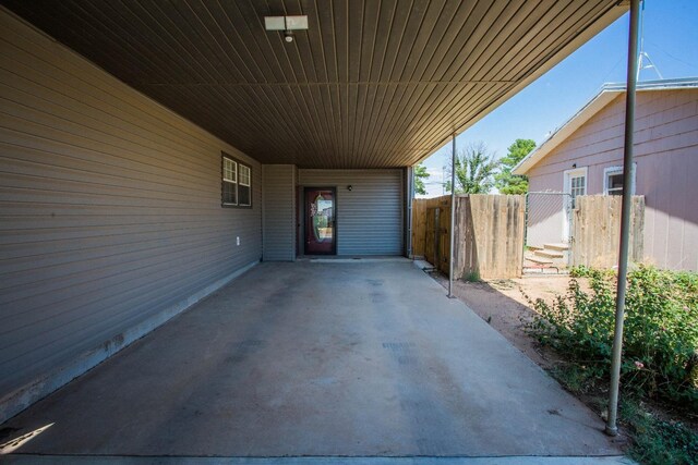 view of patio / terrace with a carport