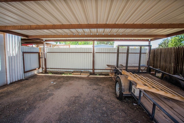 view of patio with an outbuilding