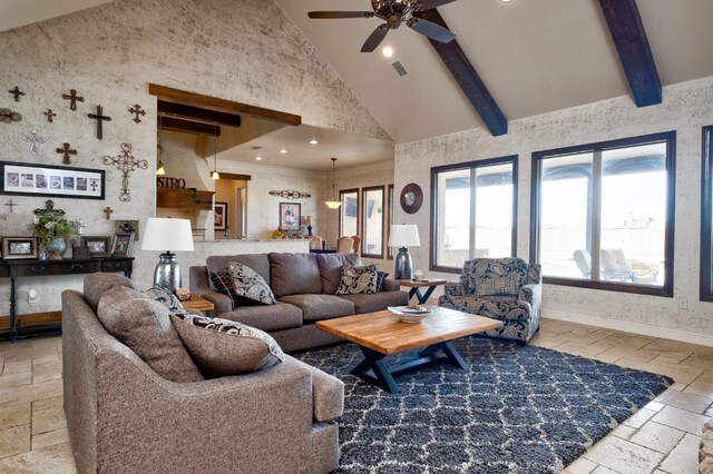 living room featuring beamed ceiling, ceiling fan, and high vaulted ceiling