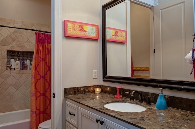 full bathroom featuring vanity, toilet, and shower / bath combo