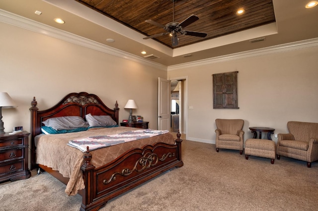 bedroom featuring a tray ceiling, ornamental molding, light colored carpet, ceiling fan, and wood ceiling