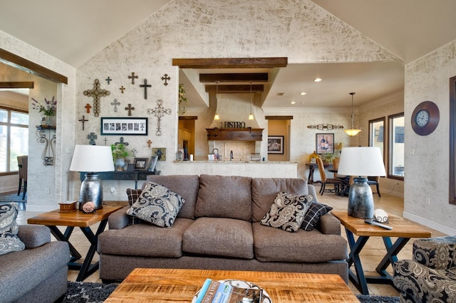 living room featuring crown molding and lofted ceiling