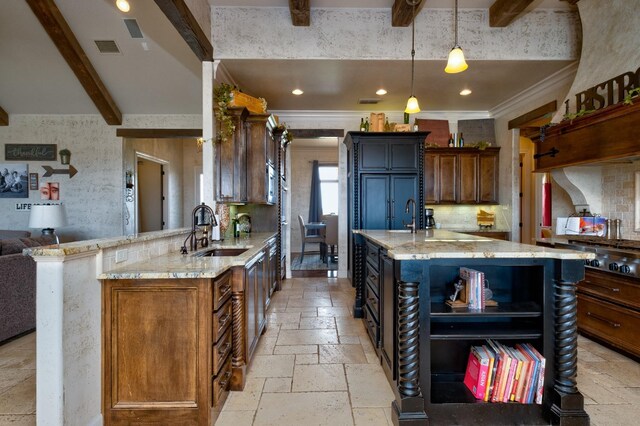 kitchen with sink, light stone counters, decorative light fixtures, kitchen peninsula, and beam ceiling