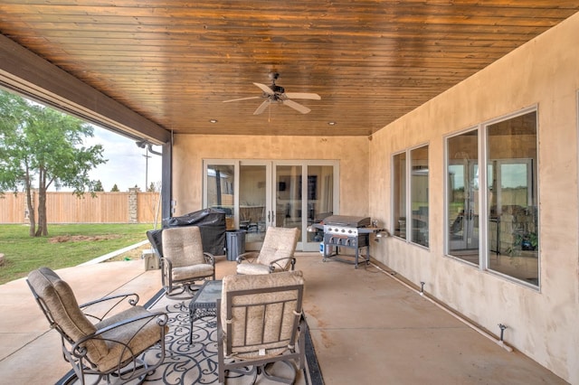 view of patio featuring ceiling fan and area for grilling