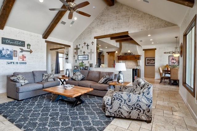 living room with ceiling fan, ornamental molding, beam ceiling, and high vaulted ceiling