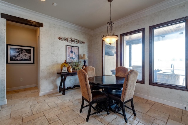 dining room featuring ornamental molding