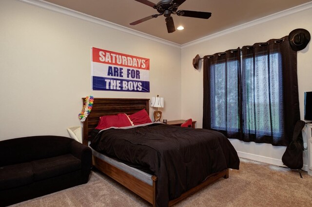 bedroom featuring crown molding, ceiling fan, and light carpet