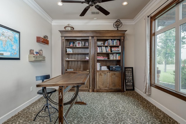 carpeted home office with crown molding and ceiling fan