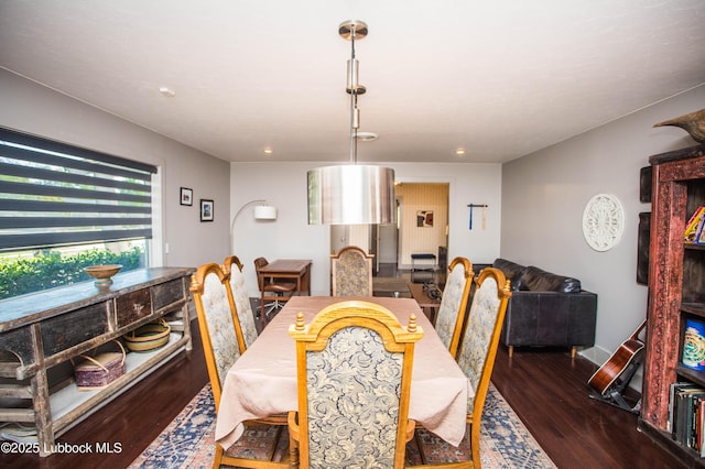 4609 10th St, Lubbock, TX 79416 - dining space featuring wood finished floors and recessed lighting
