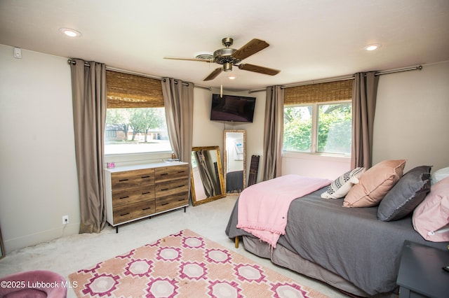 4609 10th St, Lubbock, TX 79416 - bedroom with multiple windows, recessed lighting, and light colored carpet
