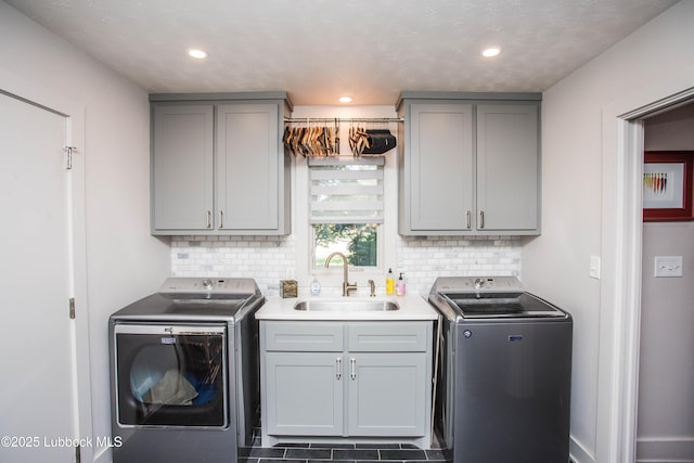 4609 10th St, Lubbock, TX 79416 - washroom featuring cabinet space, separate washer and dryer, and recessed lighting