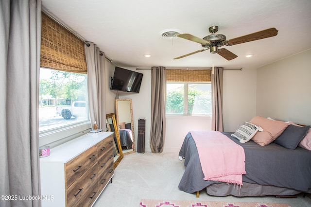 4609 10th St, Lubbock, TX 79416 - bedroom with light colored carpet, recessed lighting, and ceiling fan