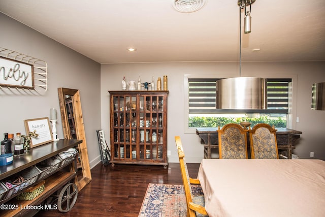 4609 10th St, Lubbock, TX 79416 - dining space featuring wood finished floors, recessed lighting, and baseboards