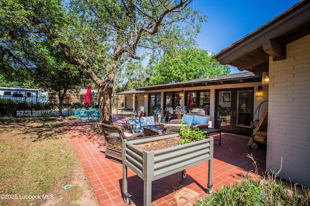 4609 10th St, Lubbock, TX 79416 - view of patio / terrace with outdoor lounge area and french doors