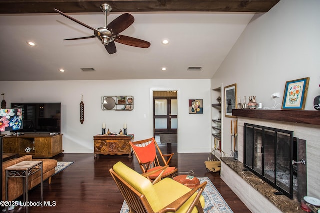 4609 10th St, Lubbock, TX 79416 - living room with ceiling fan, vaulted ceiling, a premium fireplace, built in features, and wood finished floors