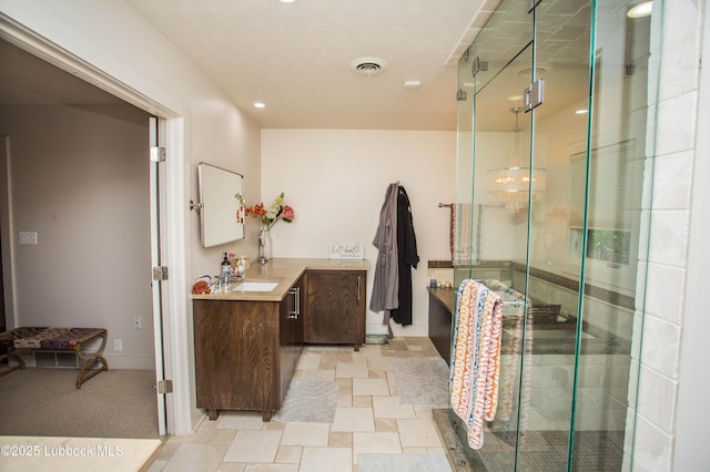 4609 10th St, Lubbock, TX 79416 - full bathroom featuring vanity, a stall shower, and recessed lighting