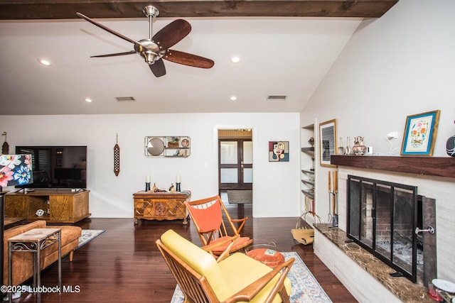 4609 10th St, Lubbock, TX 79416 - living area featuring a ceiling fan, a high end fireplace, vaulted ceiling, wood finished floors, and baseboards