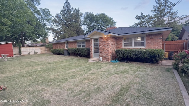 3806 56th St, Lubbock, TX 79413 - view of front of house with brick siding and a chimney
