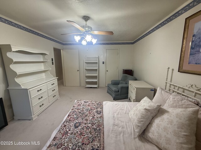 3806 56th St, Lubbock, TX 79413 - bedroom with light carpet and a ceiling fan