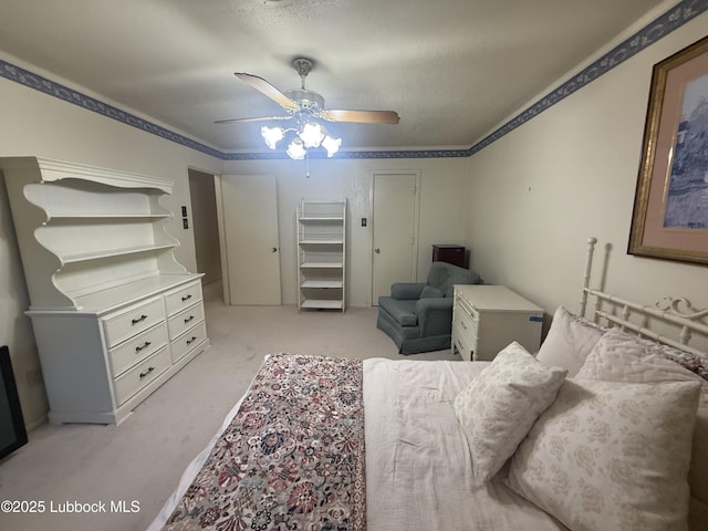 3806 56th St, Lubbock, TX 79413 - bedroom with light colored carpet and a ceiling fan
