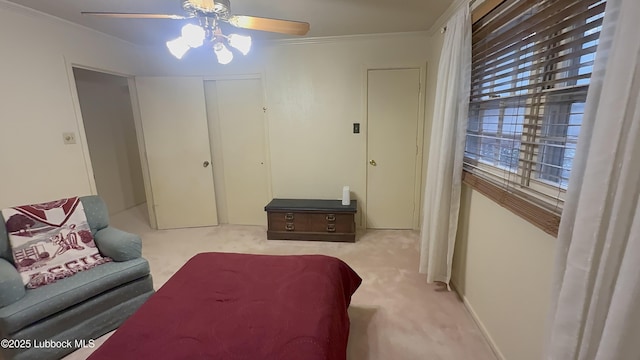 3806 56th St, Lubbock, TX 79413 - carpeted living area featuring a ceiling fan and ornamental molding
