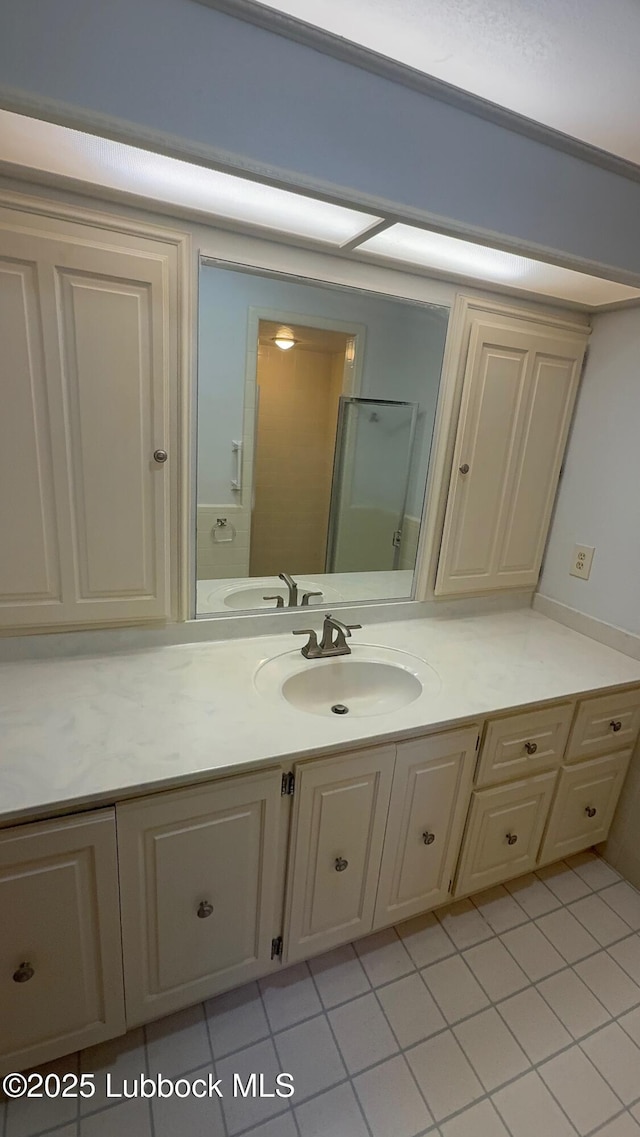 3806 56th St, Lubbock, TX 79413 - bathroom featuring vanity and tile patterned flooring