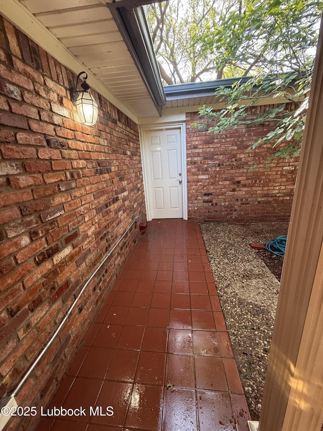 3806 56th St, Lubbock, TX 79413 - doorway to property with brick siding
