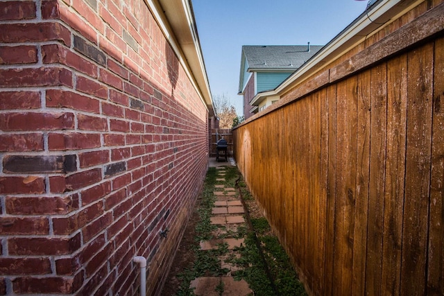 4612 120th Pl, Lubbock, TX 79424 - view of property exterior featuring brick siding and fence