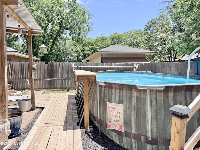 5623 87th St, Lubbock, TX 79424 - view of pool with a fenced backyard and a deck