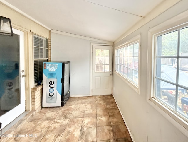 5623 87th St, Lubbock, TX 79424 - unfurnished sunroom featuring vaulted ceiling