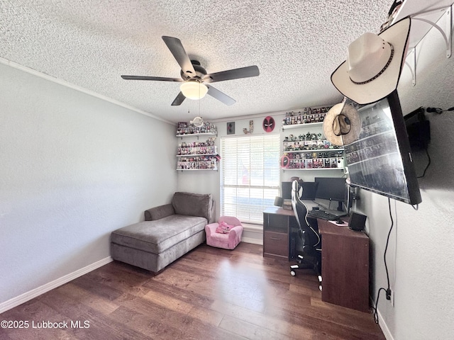 5623 87th St, Lubbock, TX 79424 - office with ceiling fan, wood finished floors, a textured ceiling, and baseboards