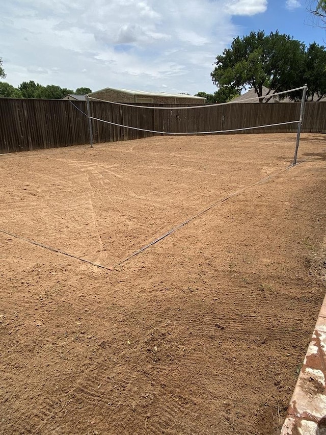 surrounding community featuring volleyball court