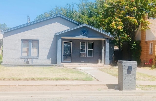 bungalow-style home featuring a porch