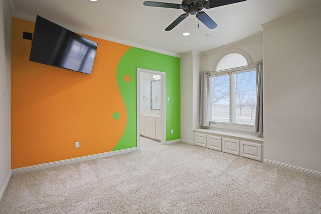 interior space featuring ornamental molding and ceiling fan