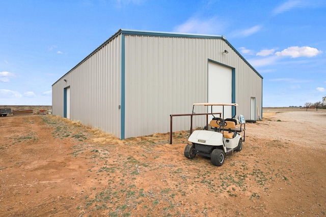 view of outdoor structure featuring a garage