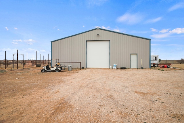 view of outdoor structure with a garage