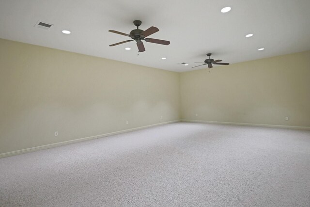 empty room with light carpet and ceiling fan