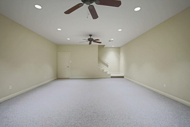 spare room featuring light carpet