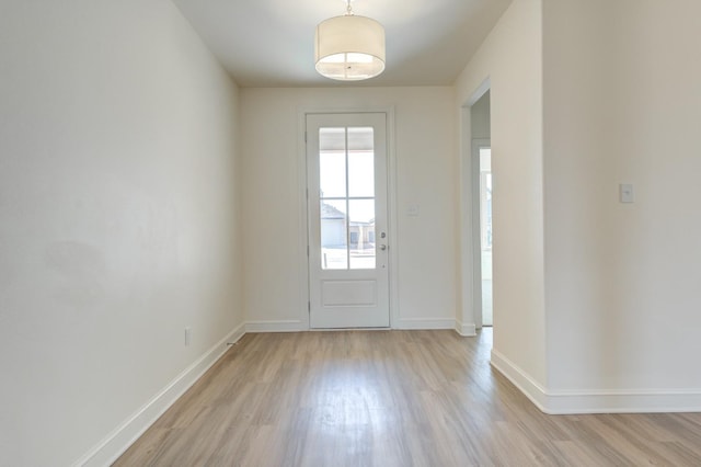 doorway featuring light hardwood / wood-style floors