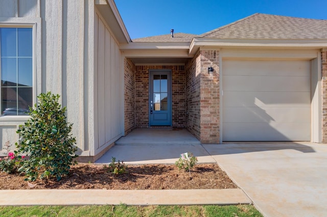 property entrance with a garage