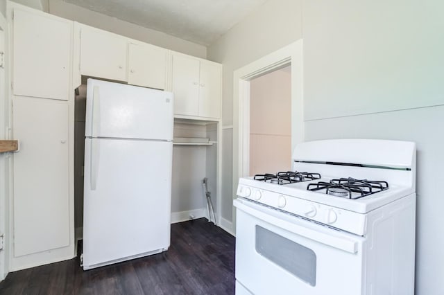 kitchen featuring white cabinetry, dark hardwood / wood-style flooring, and white appliances