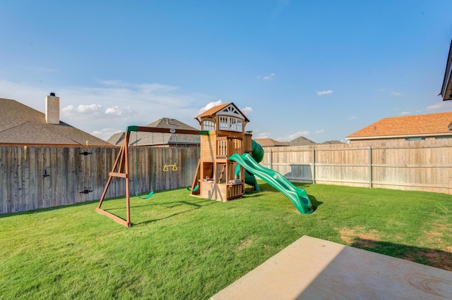 view of jungle gym with a yard