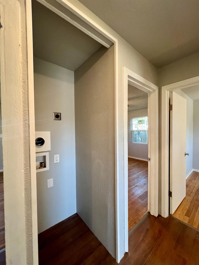 hallway with dark wood-type flooring